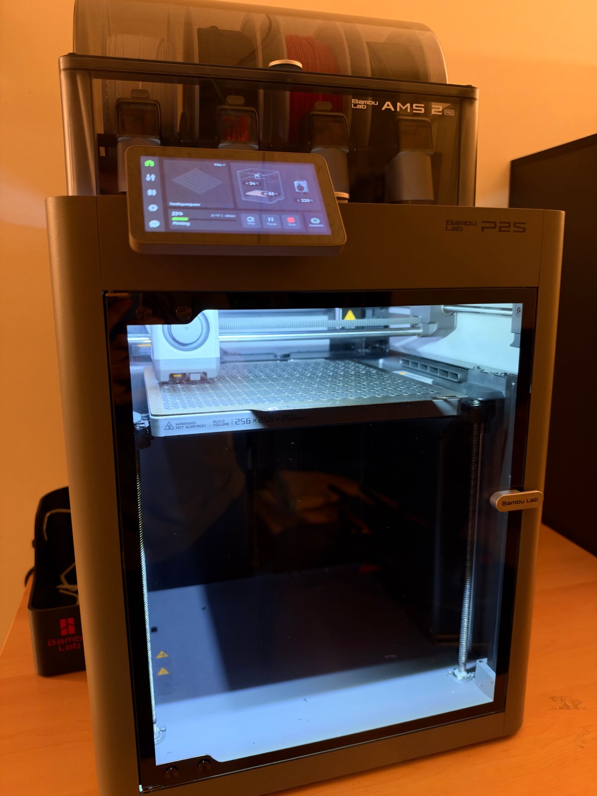 Our studio’s Bambu Lab P2S printer with its AMS 2 Pro filament system